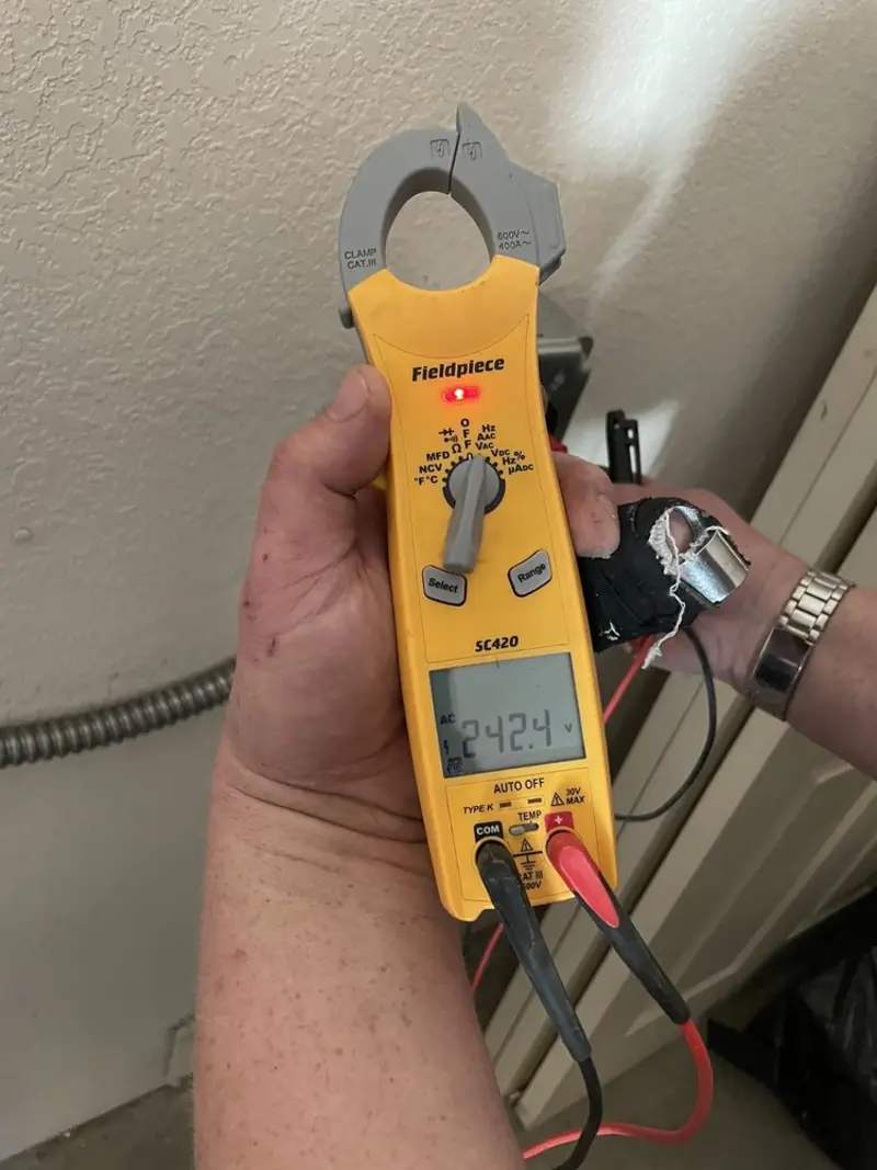 Voltage testing with clamp meter during Generator Installation in Bellflower